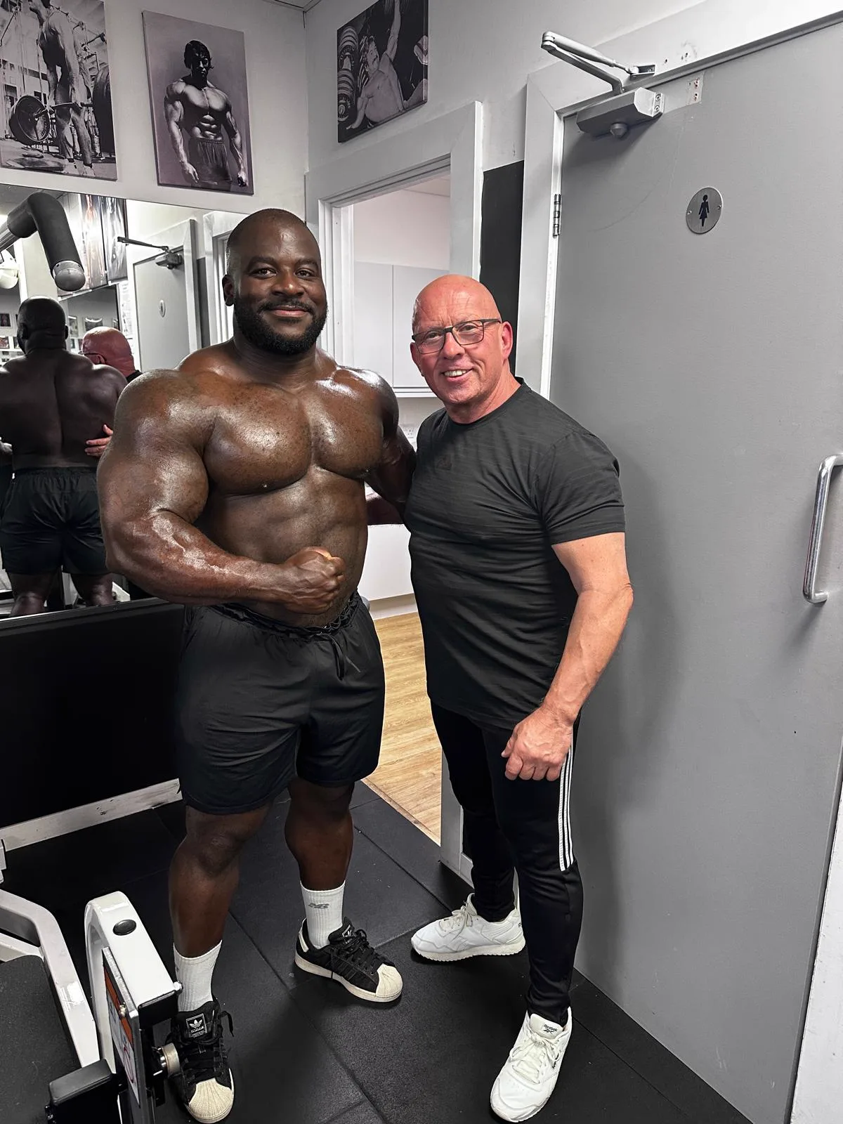 Derek Lyons with a long-term competitive bodybuilding client at DL Performance Therapy